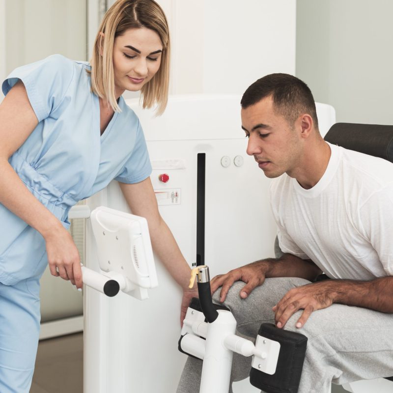 doctor-teaching-patient-how-use-medical-device
